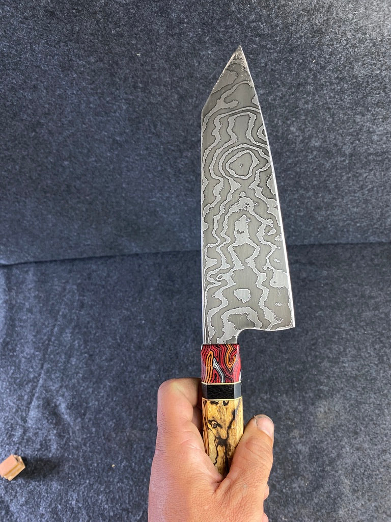 random pattern damascus chefs knife