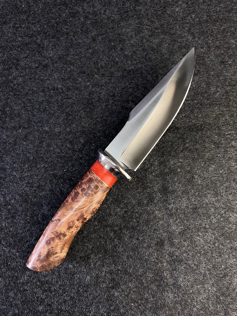 Big Game hunter in redwood lace burl