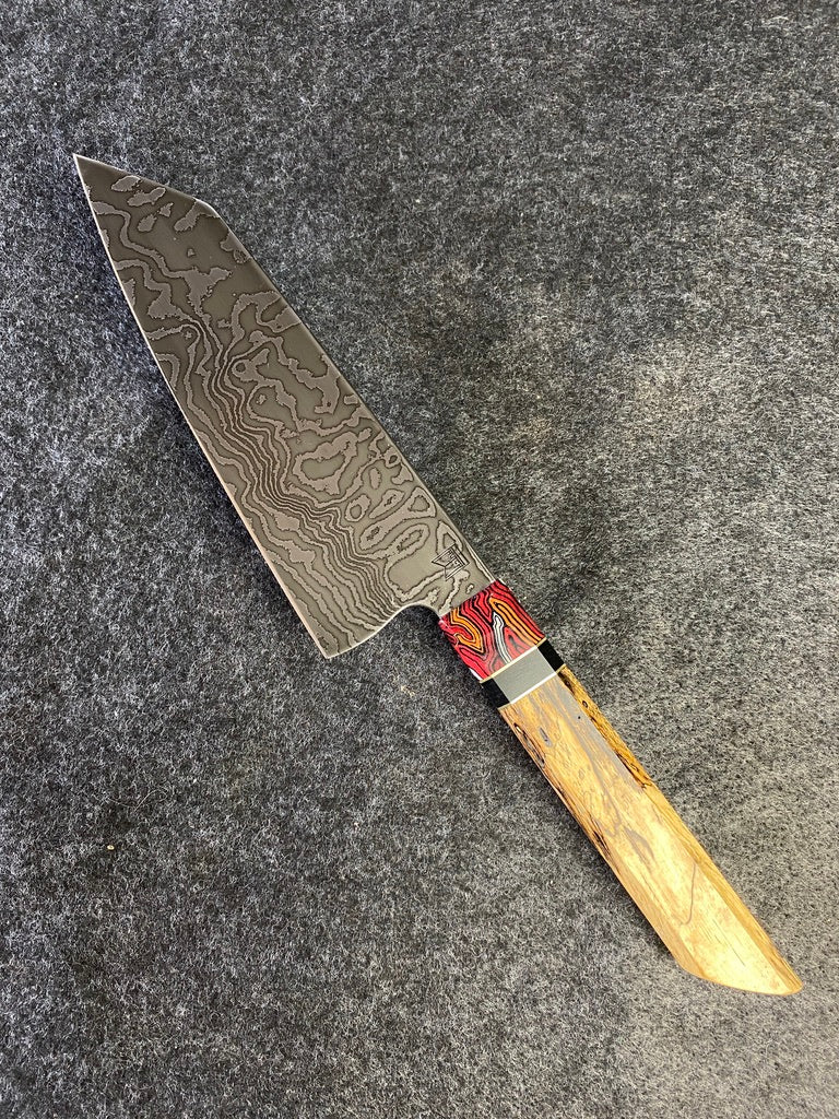 random pattern damascus chefs knife