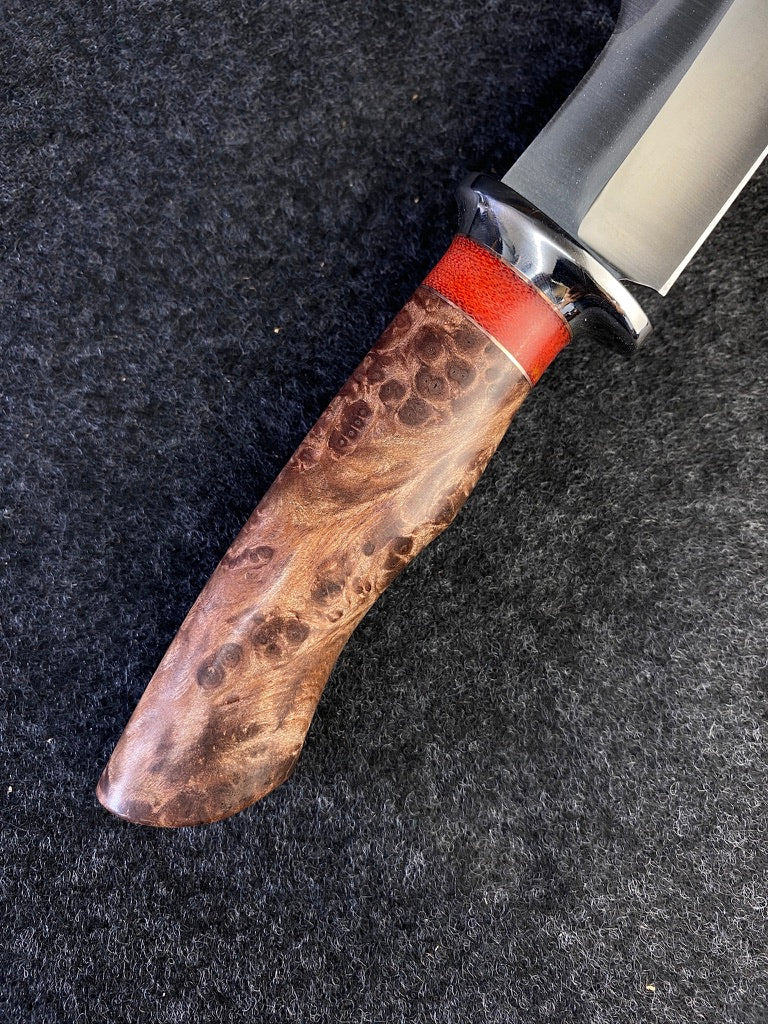 Big Game hunter in redwood lace burl