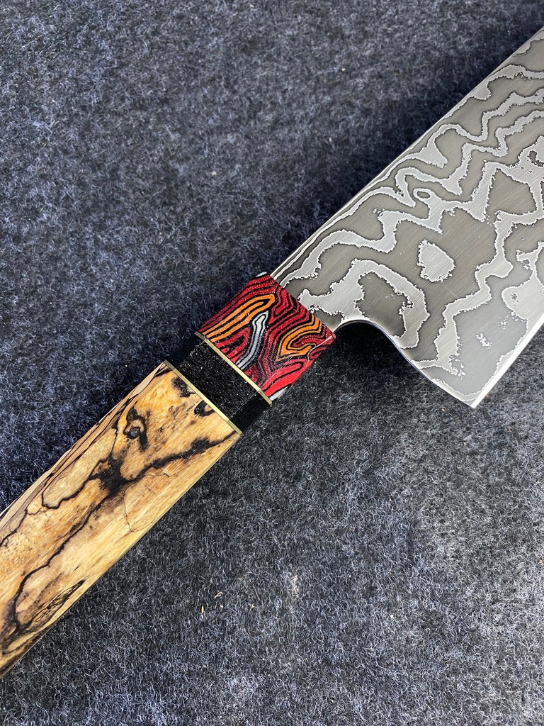 random pattern damascus chefs knife
