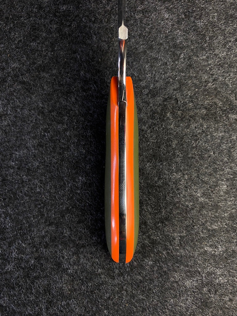 stainless edc in orange and green g-10