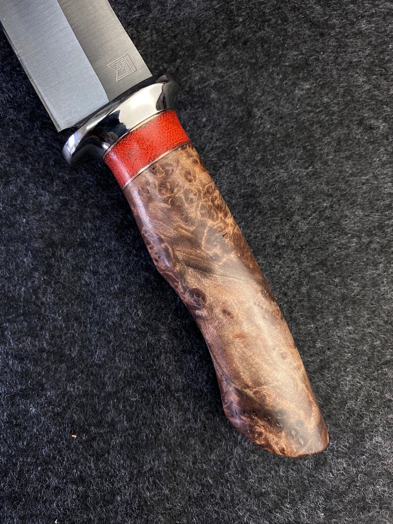 Big Game hunter in redwood lace burl