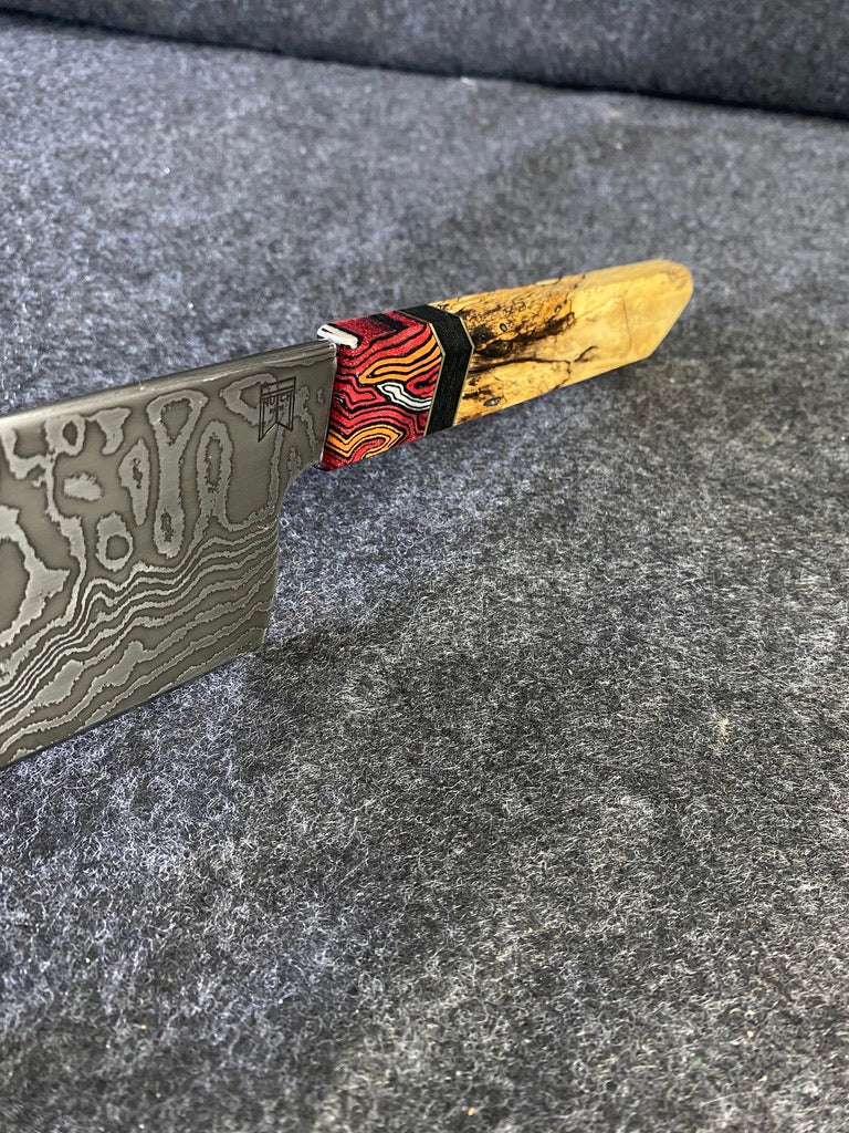 random pattern damascus chefs knife