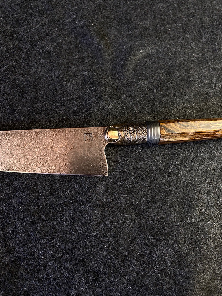 thumbs up damascus chefs knife