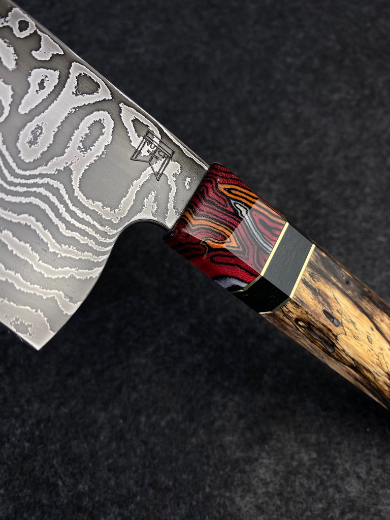 random pattern damascus chefs knife