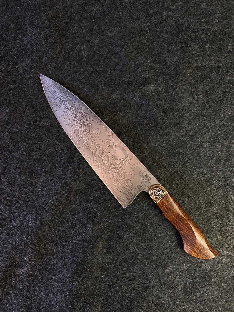 Damascus chefs with ringed myall and rose bolster