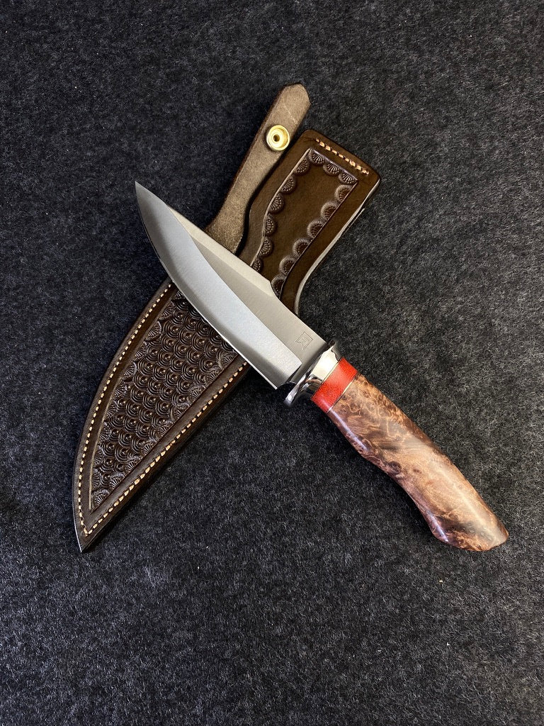 Big Game hunter in redwood lace burl