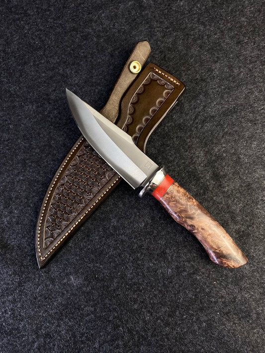 Big Game hunter in redwood lace burl