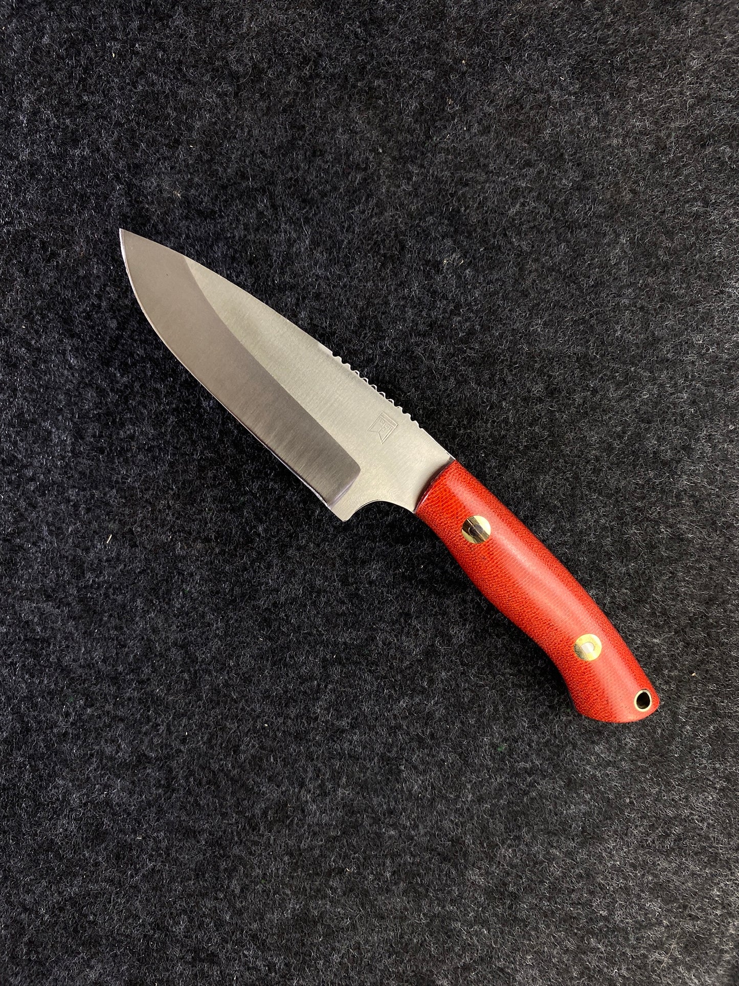 stainless edc in fire canvas micarta
