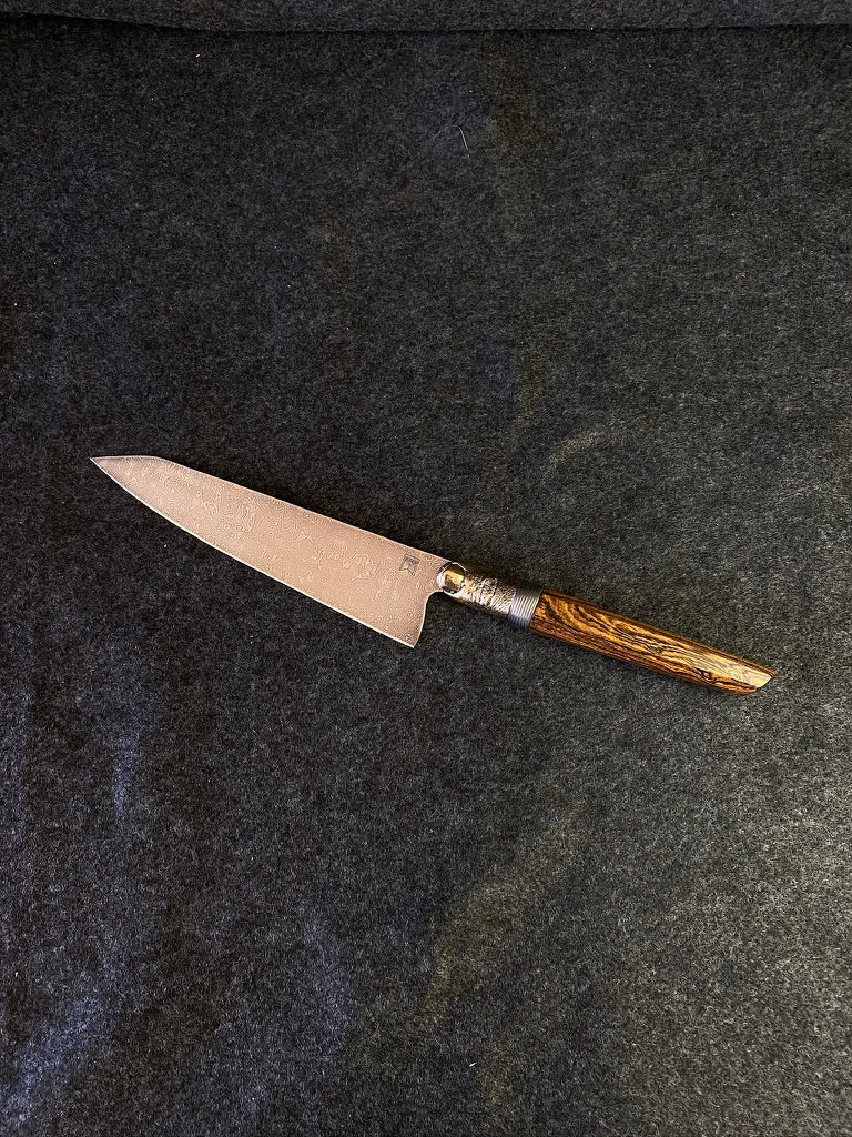 thumbs up damascus chefs knife