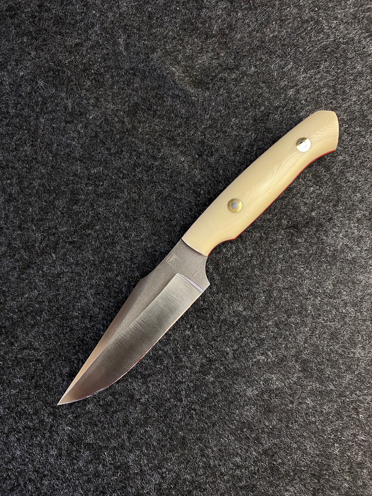Premium hunter with linen micarta