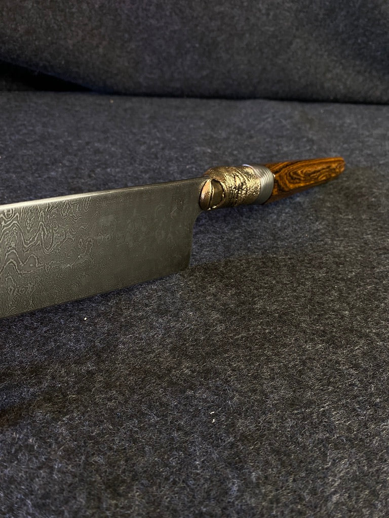 thumbs up damascus chefs knife