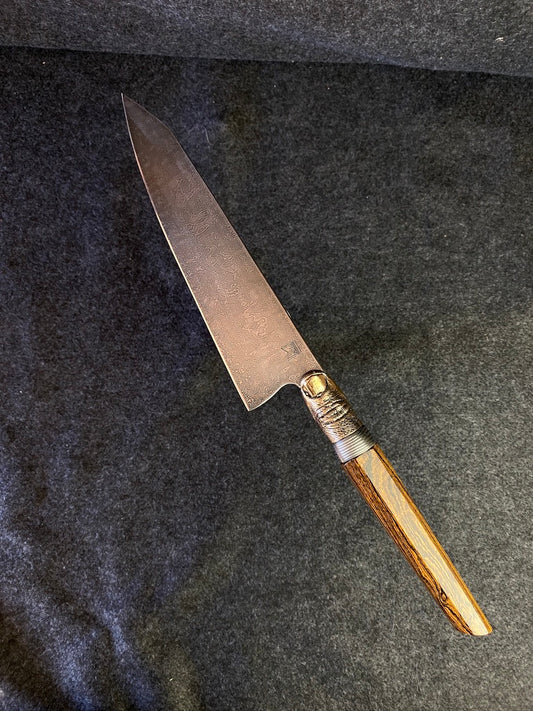 thumbs up damascus chefs knife