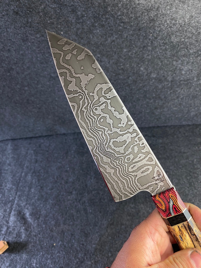 random pattern damascus chefs knife