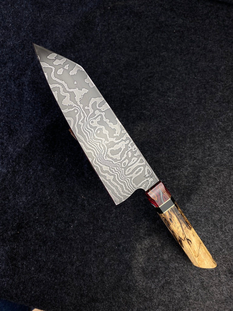 random pattern damascus chefs knife