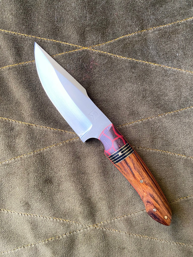 Stainless clip point belt knife