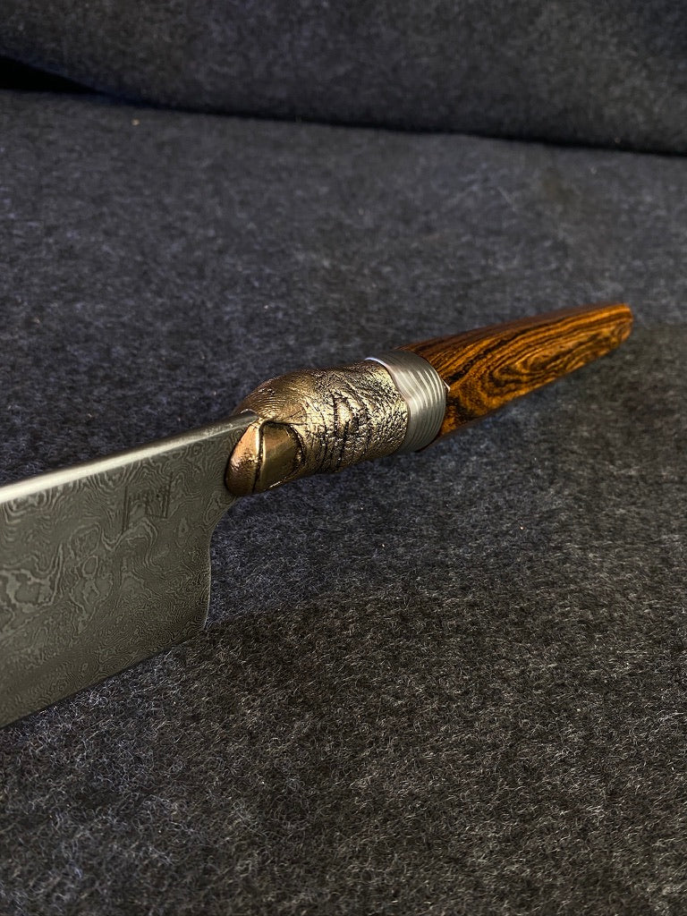thumbs up damascus chefs knife