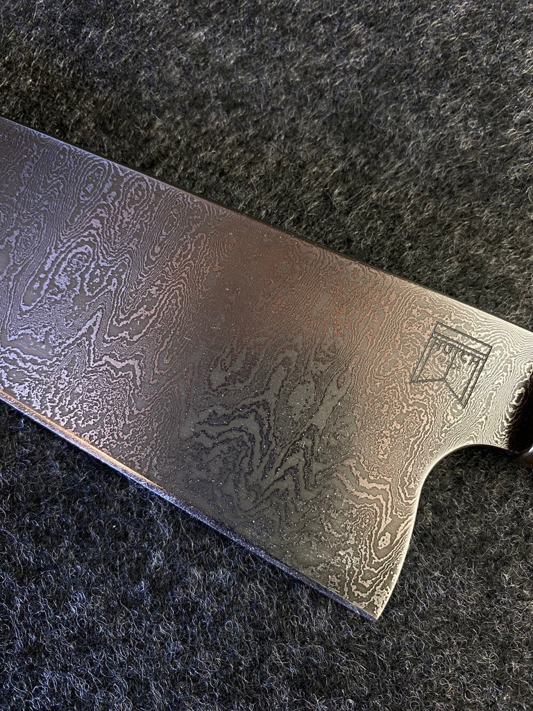 240 layer damascus with bronze bolster