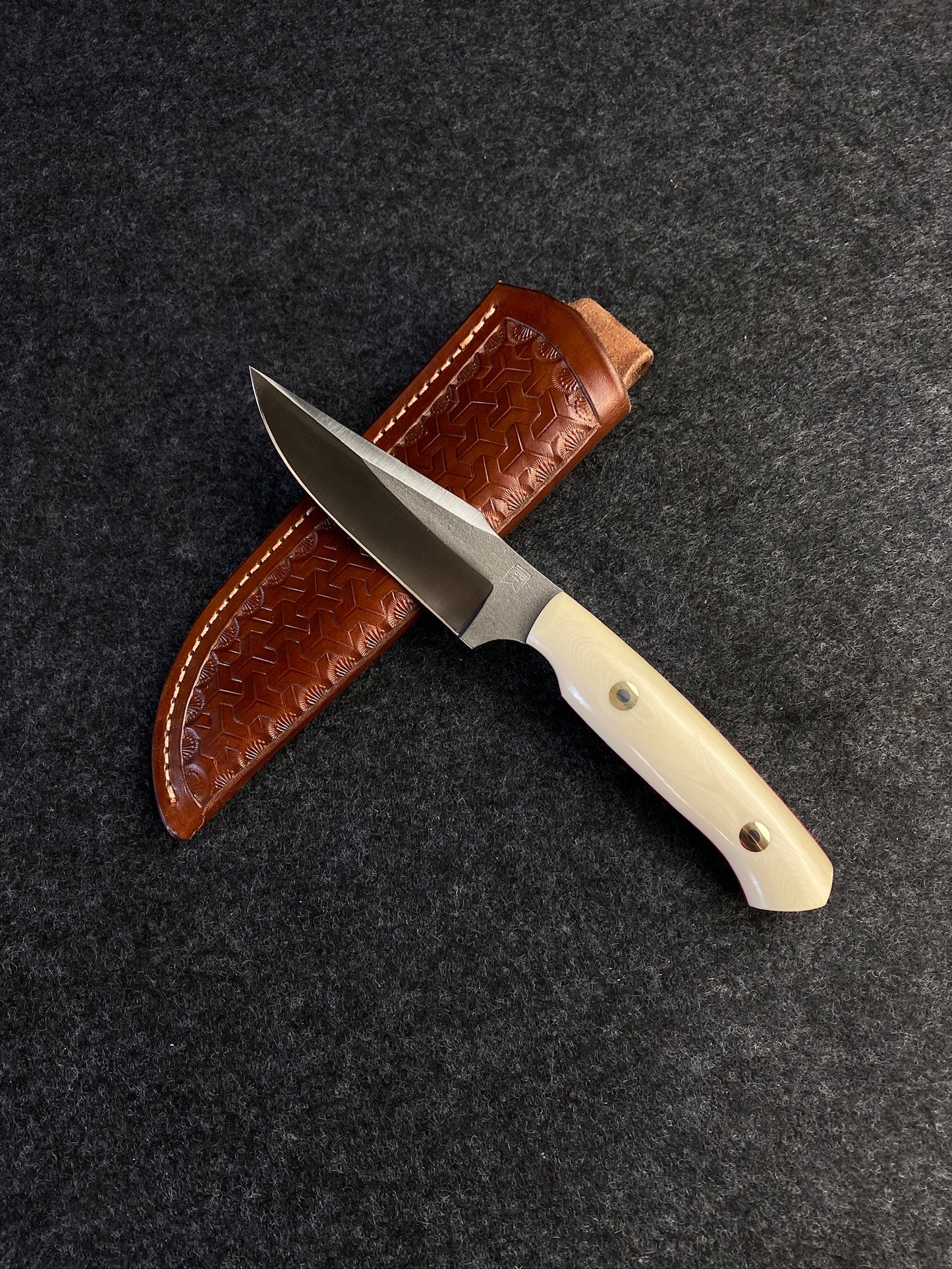 Premium hunter with linen micarta