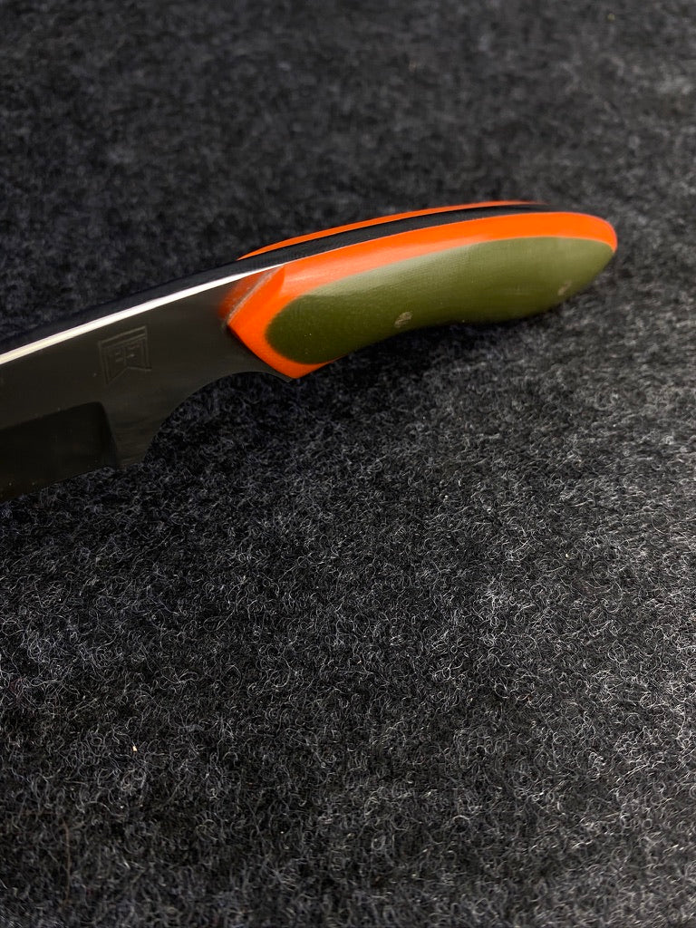 stainless edc in orange and green g-10