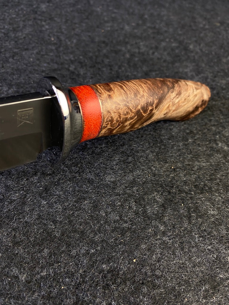 Big Game hunter in redwood lace burl