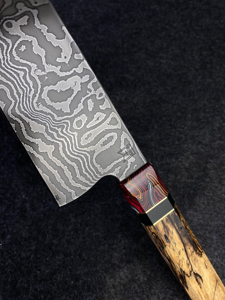 random pattern damascus chefs knife