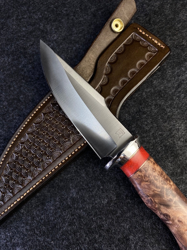 Big Game hunter in redwood lace burl