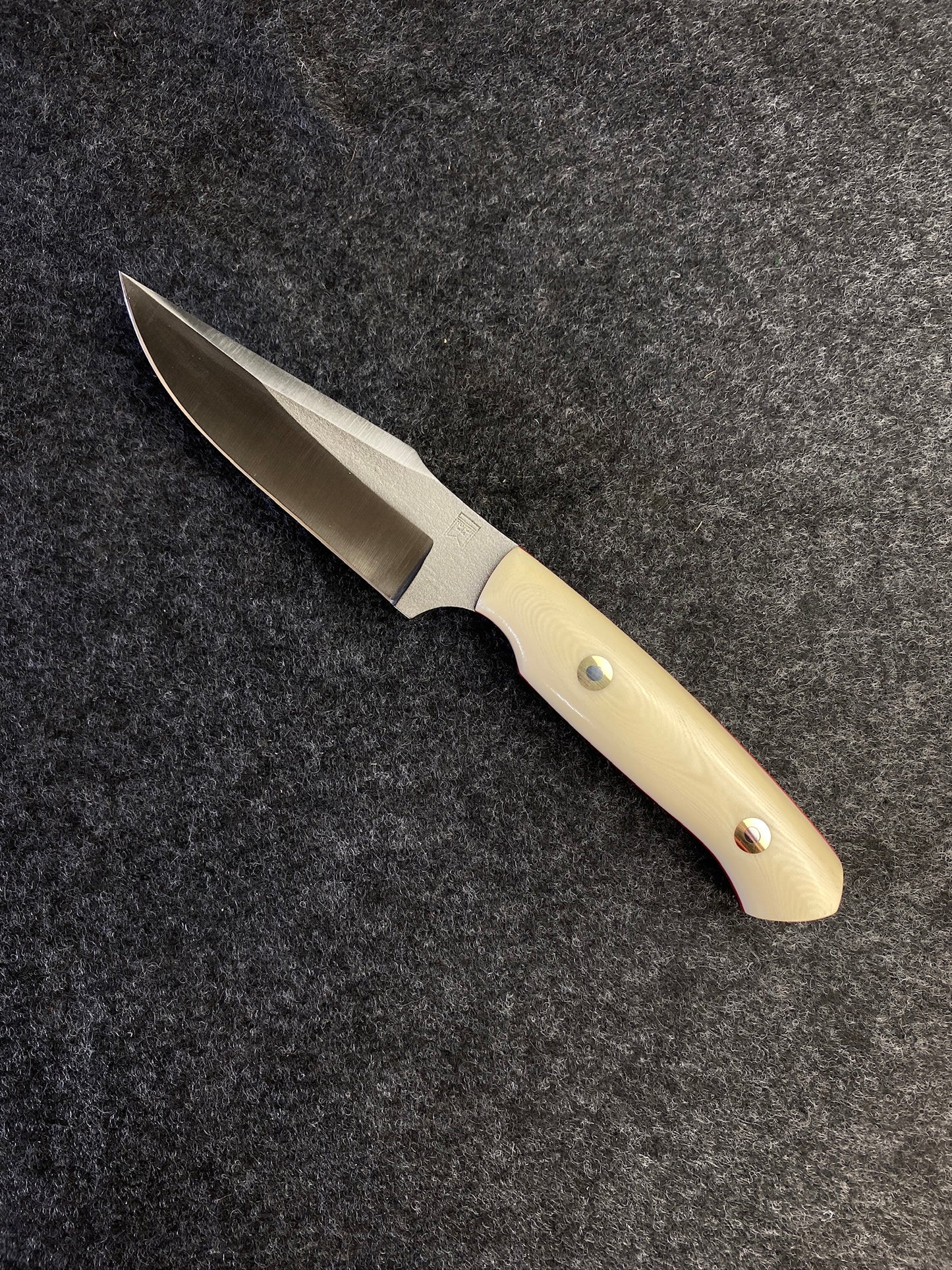Premium hunter with linen micarta