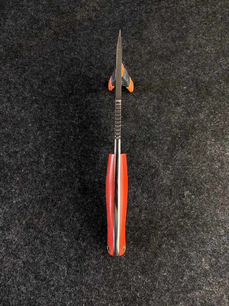 stainless edc in fire canvas micarta
