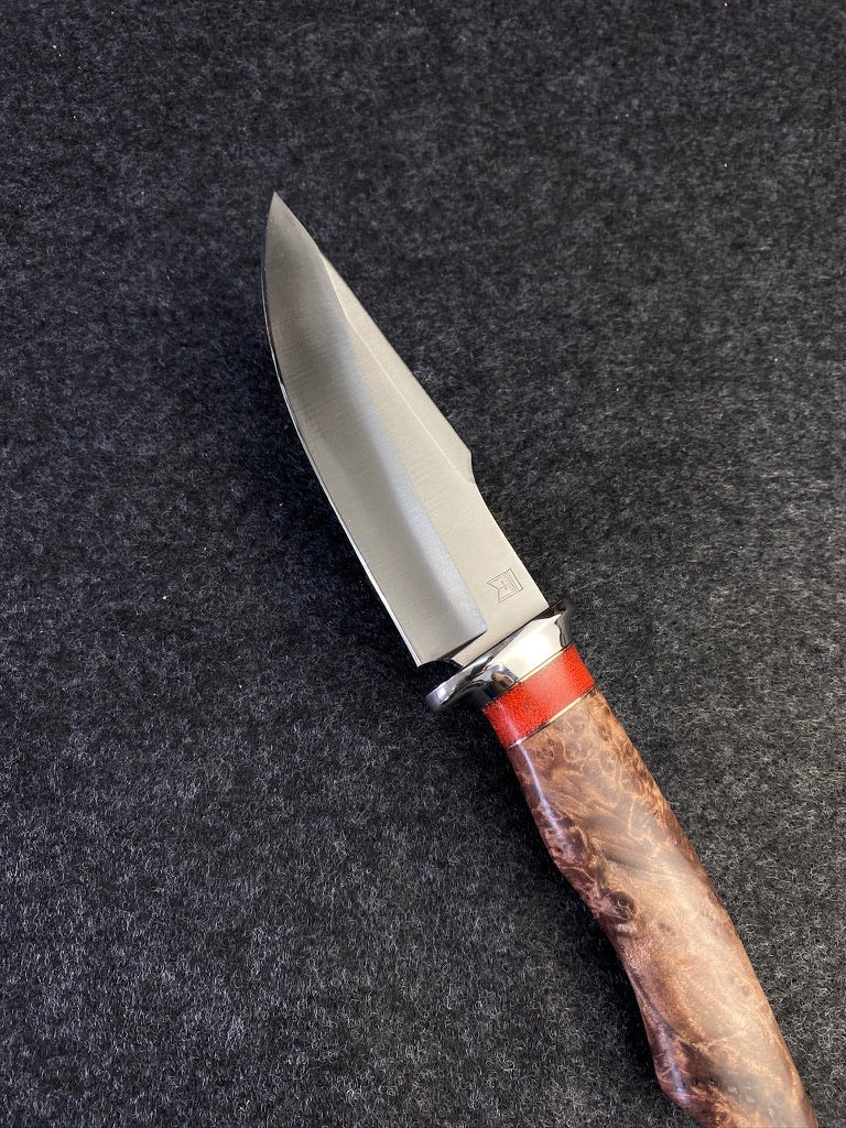 Big Game hunter in redwood lace burl